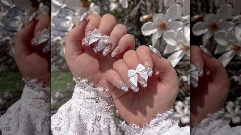 Coquette nails with cloud details