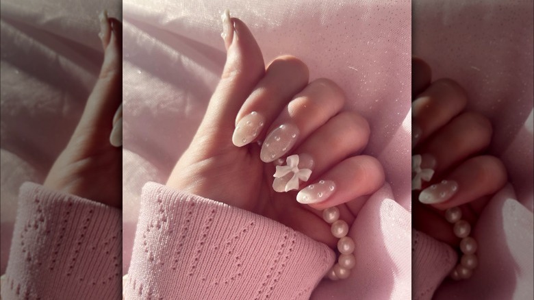 Pearls and bows coquette manicure