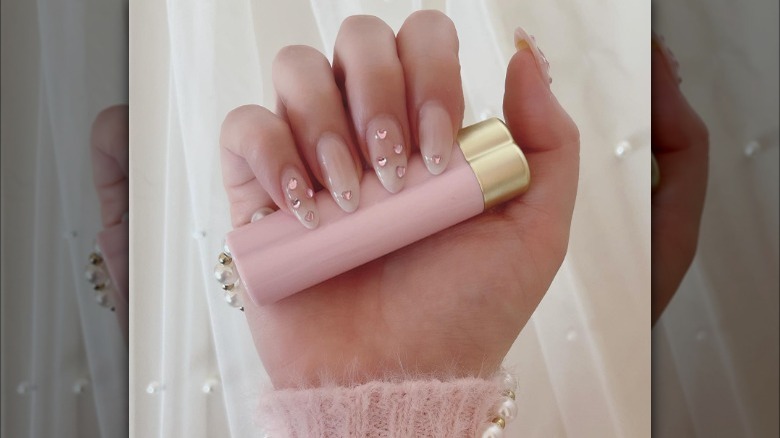 Bright pink gem nails