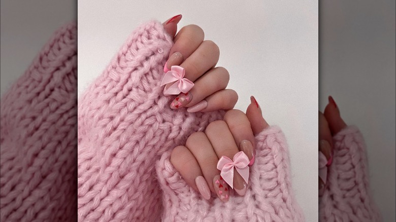 Coquette manicure with satin bows