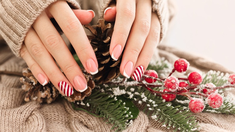 Holiday manicure with stripes