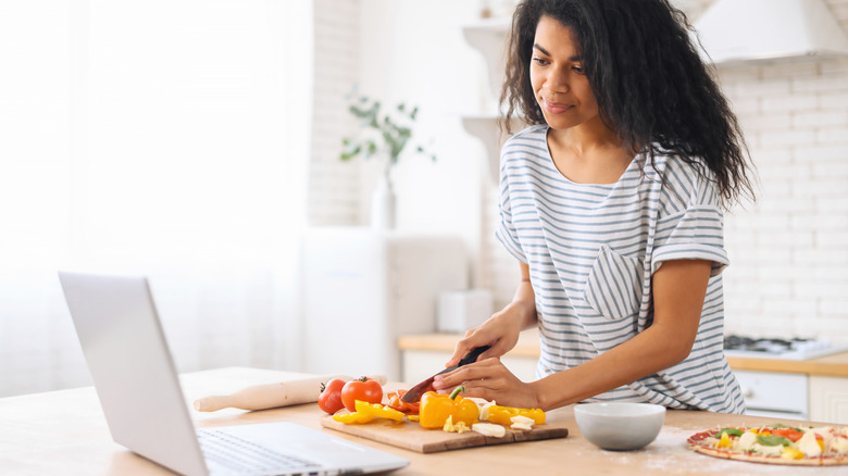 woman watching a virtual cooking class