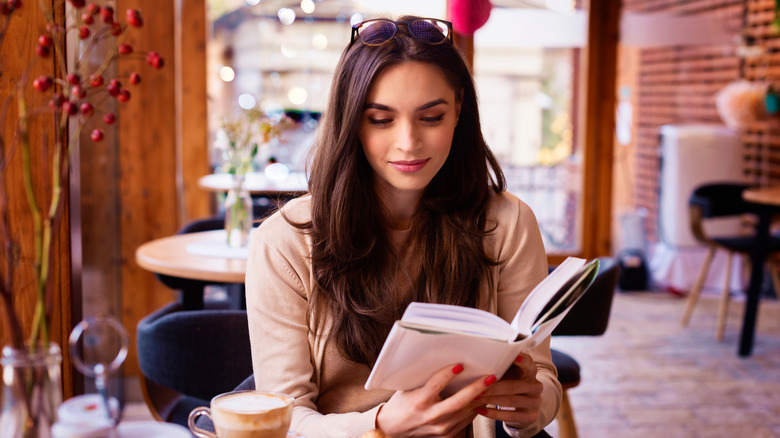 woman reading outside