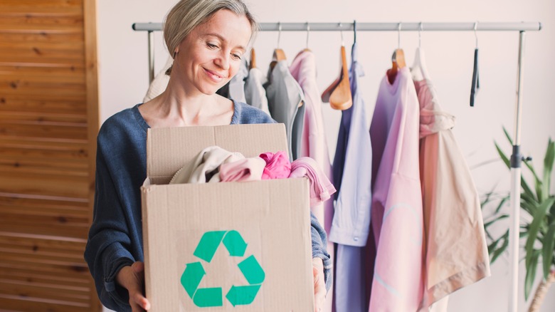 woman cleaning closet