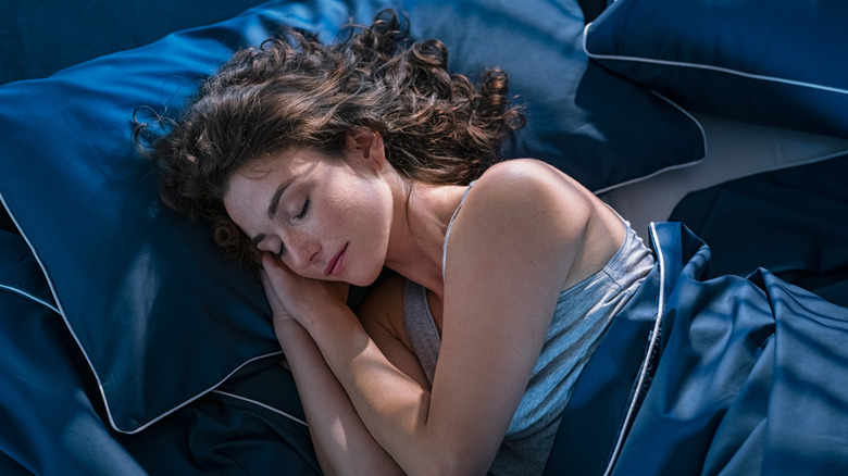 woman napping in bed