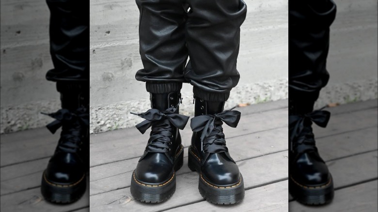 Doc Marten boots with black ribbon shoelaces 
