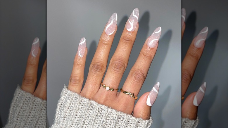 white glitter swirl manicure