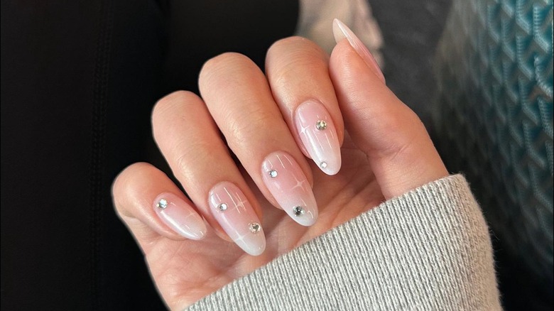 white nails with gems