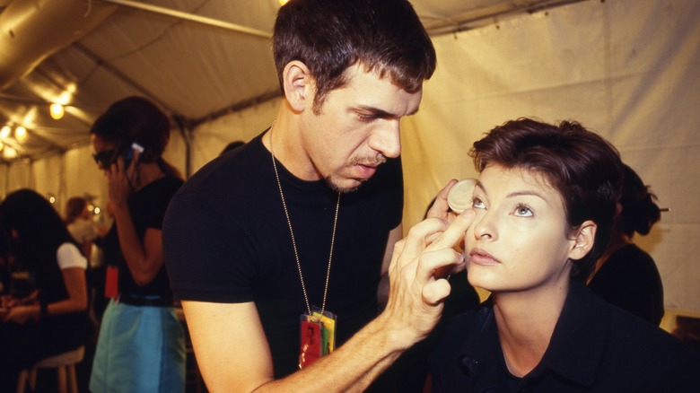 Author Kevyn Aucoin applying makeup 