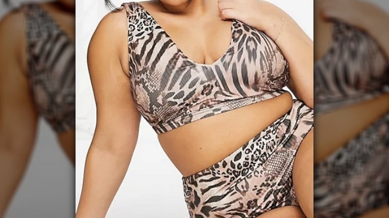 Curvy woman in a leopard bikini