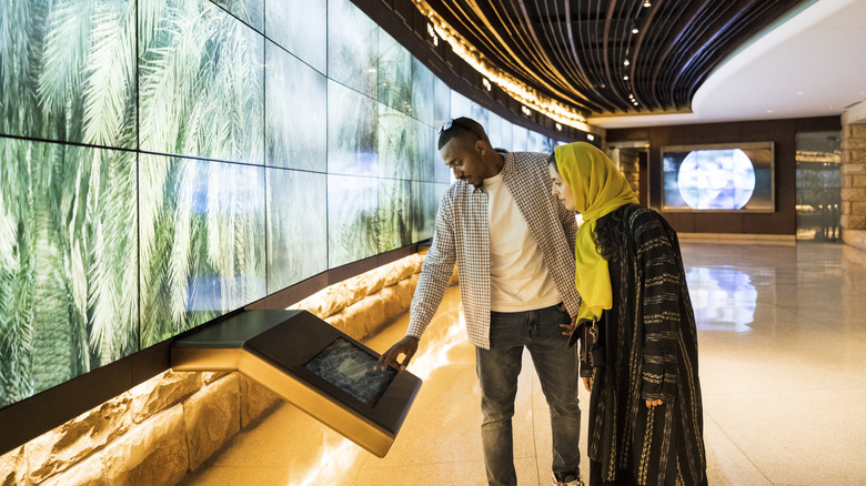 couple enjoying museum exhibit