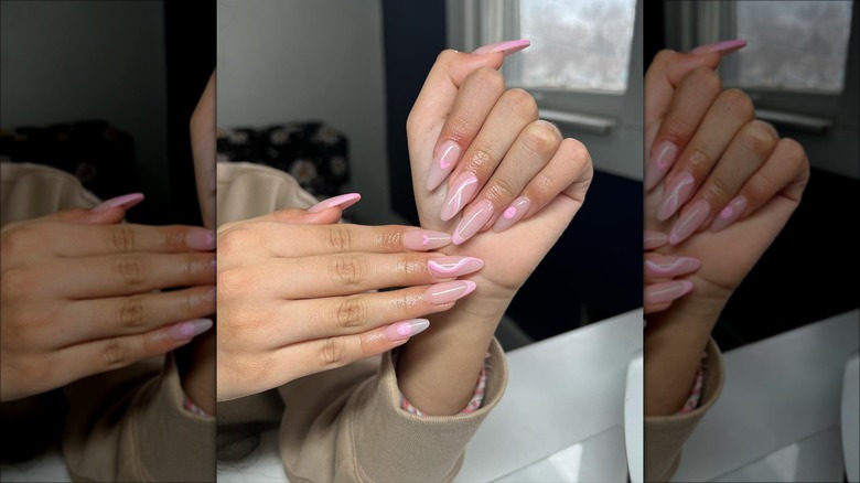 Almond shaped pink swirl manicure