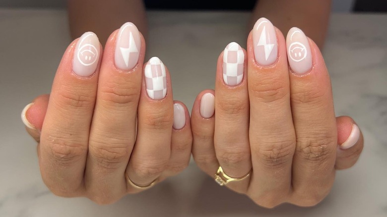 White manicure with white designs