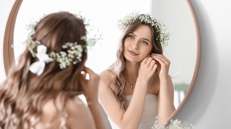 Bride looking in the mirror