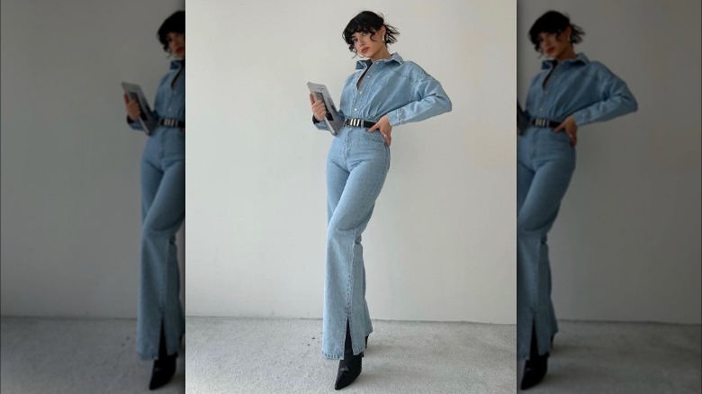 Woman wearing a denim jumpsuit