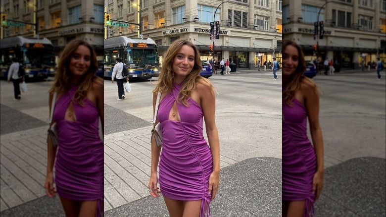 Woman wearing purple mini dress