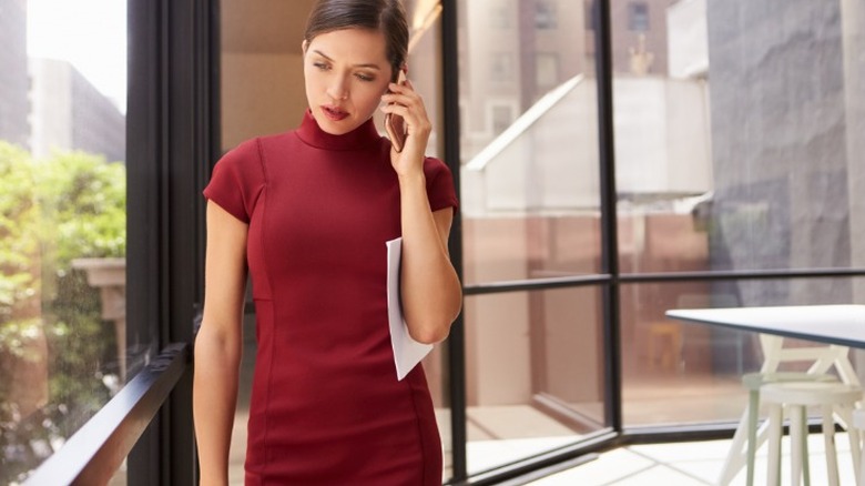 woman wearing sheath dress