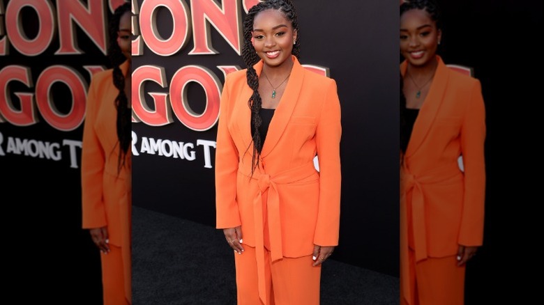 woman wearing orange suit