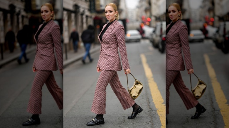 Woman wearing patterned suit