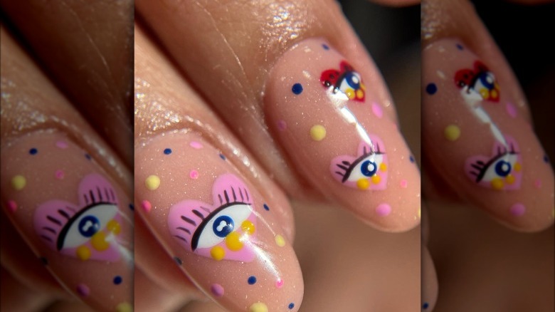 Woman with evil eye nails