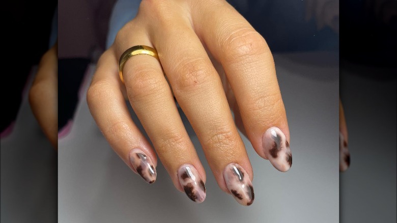 Woman with animal print nails