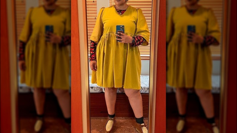 Woman in a yellow mini dress 