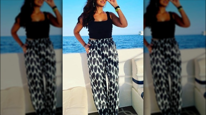 woman black and white patterned pants