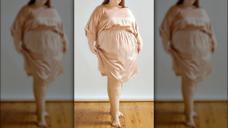 Plus-size woman pink silk dress