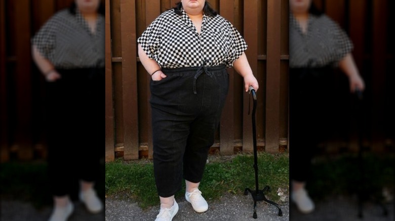 Plus size woman cane checkered shirt