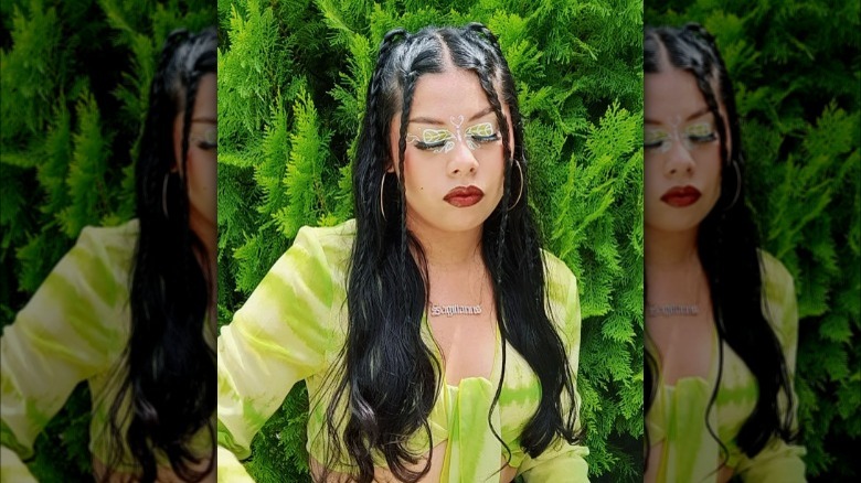 Woman with braided half-up, half-down hair