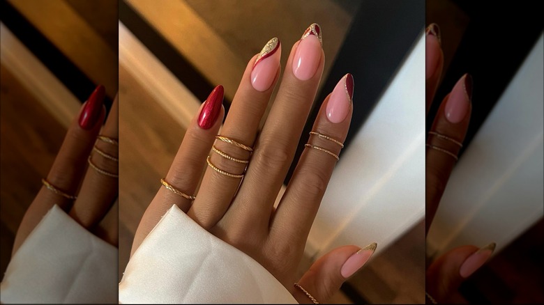 red and gold accent nails