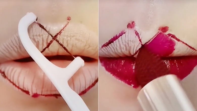 Woman using dental floss for her lipstick