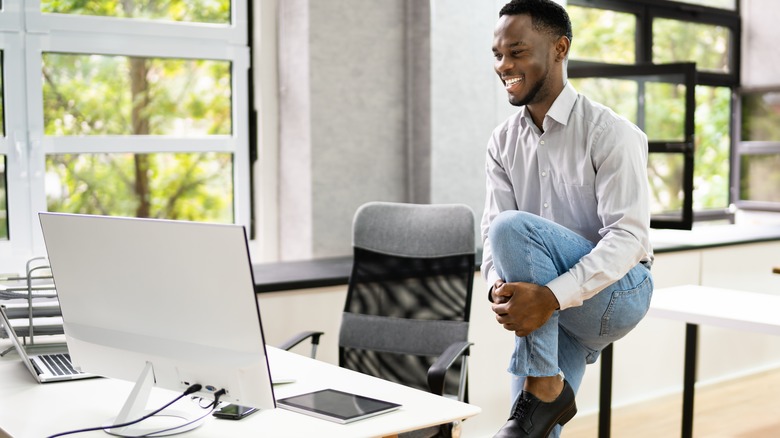 Man doing stretches at work