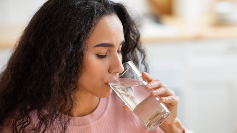 Woman drinking a glass of water