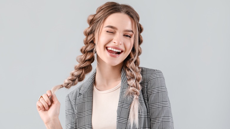 Model with two French braids