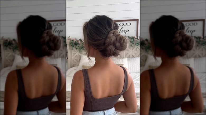 woman wearing braided low bun