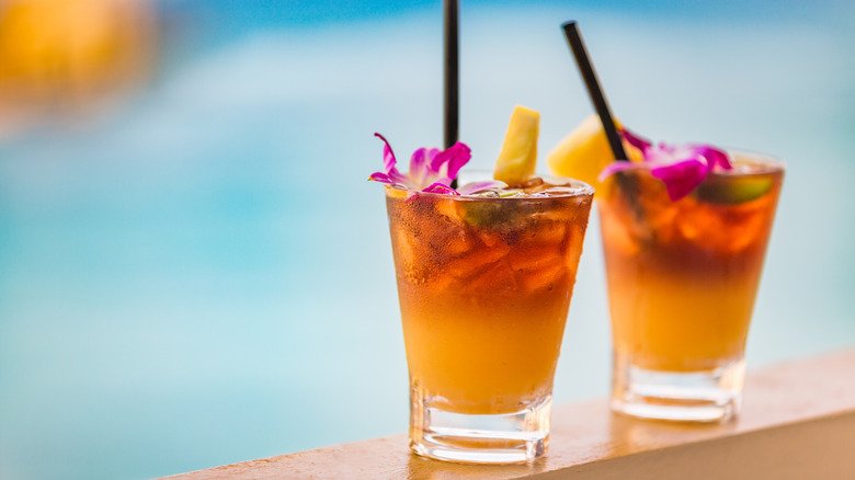 Mai Tai cocktails by a pool