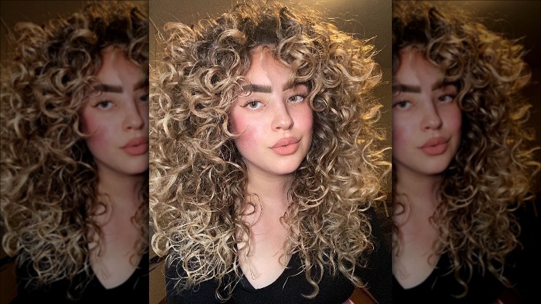 woman with voluminous curly hair