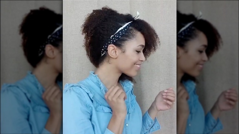 woman wearing headband in curly hair