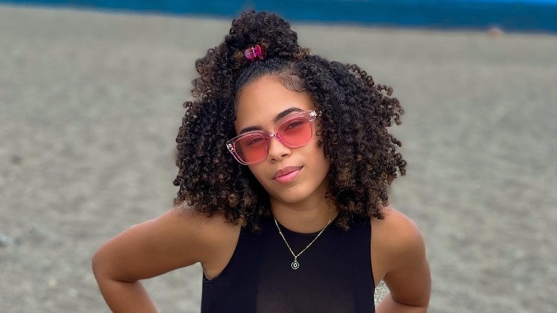 woman with half up curly hair