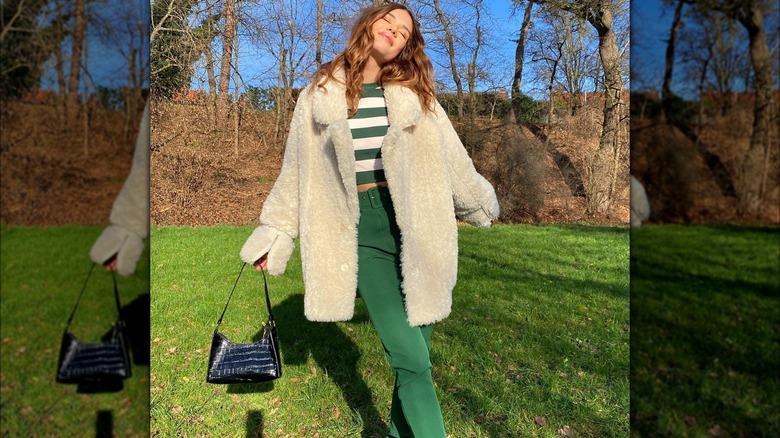 woman wearing beige and green winter outfit