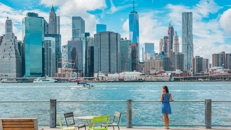 woman looking at manhattan skyline