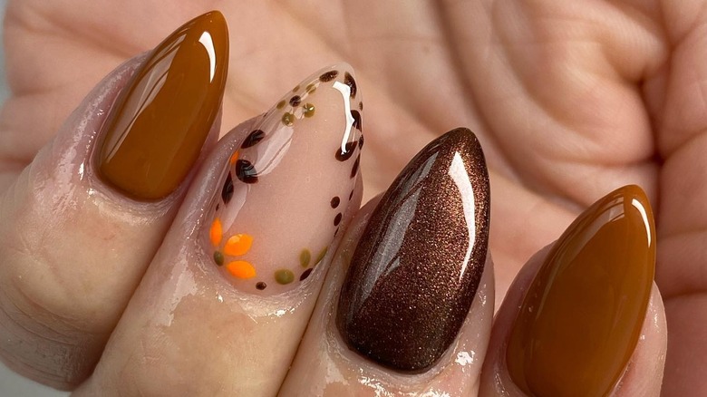 Shades of brown floral manicure