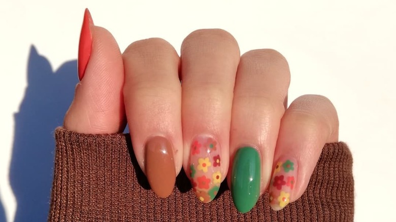 Bold floral autumnal manicure