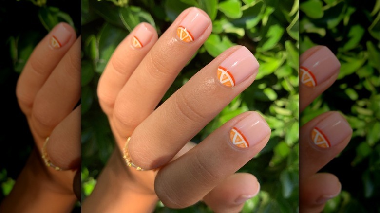 Half-moon orange nails