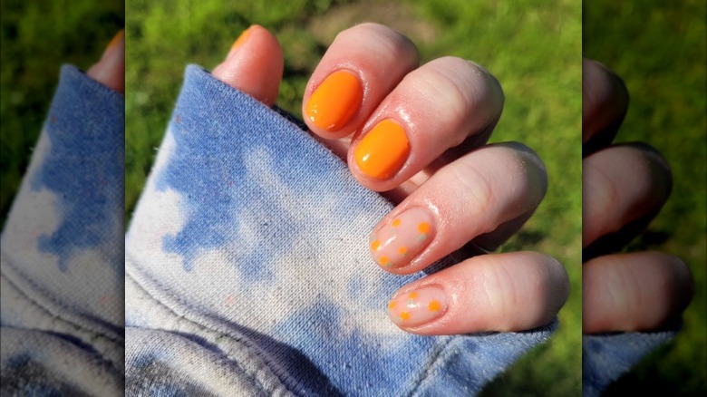Tiny orange nails