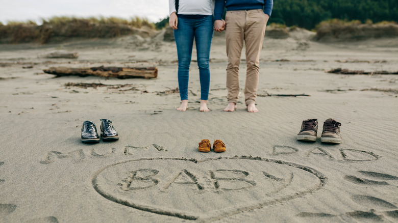 Baby message in the sand