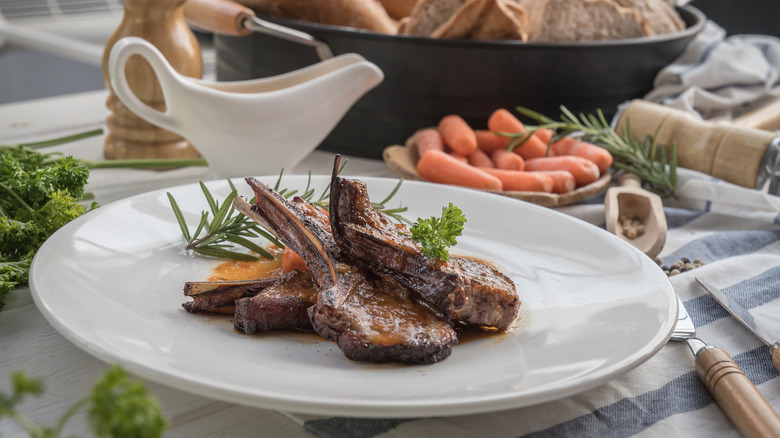 Baby lamb chops with baby carrots