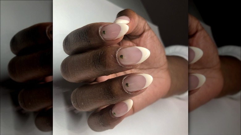 Oval bejeweled French manicure