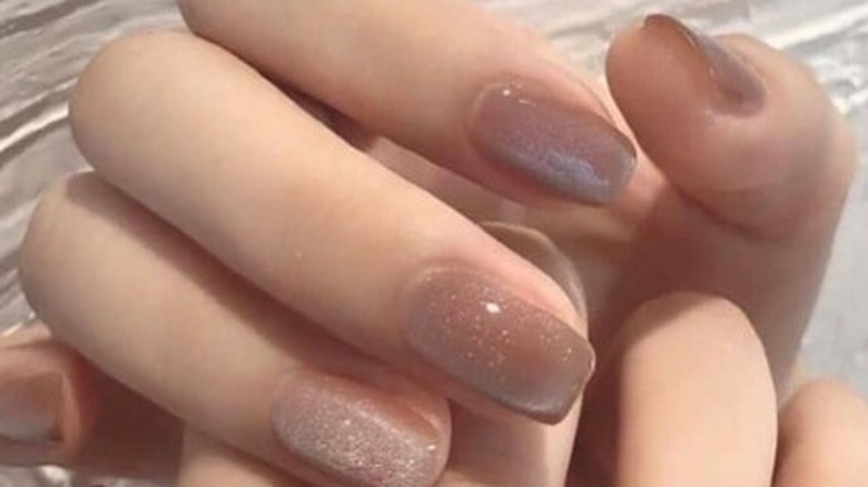 Velvety nude manicure with a shiny finish